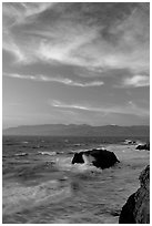 Surf and rocks at sunset seen from the Cliff House. San Francisco, California, USA ( black and white)