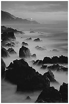 Rocks and surf at Blue hour, dusk, Garapata State Park. Big Sur, California, USA (black and white)