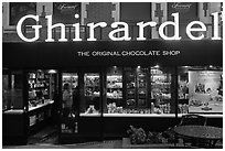 Ghirardelli chocolate store at dusk, Ghirardelli Square. San Francisco, California, USA ( black and white)