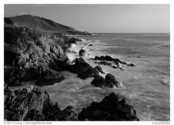 Surf and rocks at sunset, near Rocky Cny Bridge, Garapata State Park. Big Sur, California, USA (black and white)