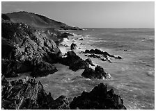 Surf and rocks at sunset, near Rocky Cny Bridge, Garapata State Park. Big Sur, California, USA ( black and white)