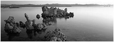 Lake sunrise with Tufa pinnacles. Mono Lake, California, USA (Panoramic black and white)