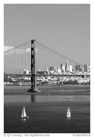 Sailboats, Golden Gate Bridge with city skyline, afternoon. San Francisco, California, USA