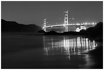 Golden Gate bridge at night from Baker Beach. San Francisco, California, USA (black and white)