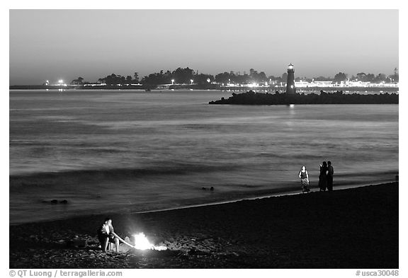 Beach campfire at sunset. Santa Cruz, California, USA (black and white)