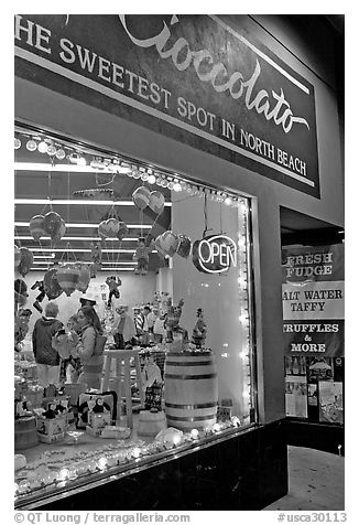 Chocolate store on Columbus Avenue at night, North Beach. San Francisco, California, USA