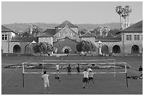 Volley-ball players in front of the Quad, late afternoon. Stanford University, California, USA (black and white)