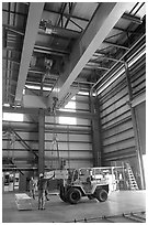 Equipment lifted in the hangar of the Stanford Linear Accelerator. Stanford University, California, USA ( black and white)