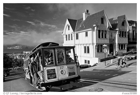 Cable car climbing, and Tudor house, late afternoon. San Francisco, California, USA