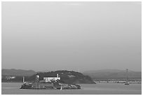 Alcatraz Island,  Yerba Buena Island, and Bay Bridge, sunset. San Francisco, California, USA (black and white)