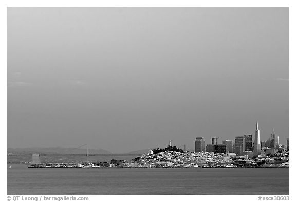City and Bay Bridge, Sunset. San Francisco, California, USA (black and white)