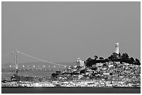 Telegraph Hill and Bay Bridge at dusk. San Francisco, California, USA (black and white)