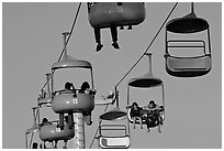 Sky glider chairs, Beach Boardwalk. Santa Cruz, California, USA ( black and white)