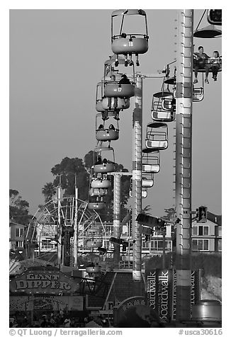 Beach Boardwalk and gondola at sunset. Santa Cruz, California, USA (black and white)