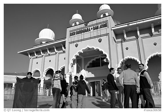 Indian immigrants gathering in fron of the Sikh Gurdwara Temple. San Jose, California, USA (black and white)