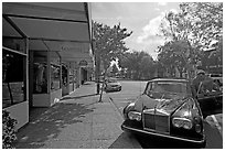 Goodwill store and Rolls-Royce on  Santa Cruz avenue. Menlo Park,  California, USA (black and white)