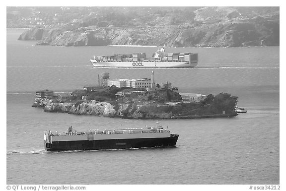 Cargo ships and Alcatraz Island in the San Francisco Bay. San Francisco, California, USA (black and white)