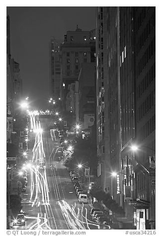 Steep California street and lights at night. San Francisco, California, USA