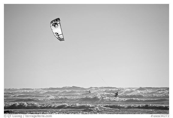 Kitesurfer in powerful waves, afternoon. San Francisco, California, USA (black and white)
