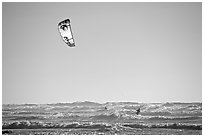 Kitesurfer in powerful waves, afternoon. San Francisco, California, USA (black and white)
