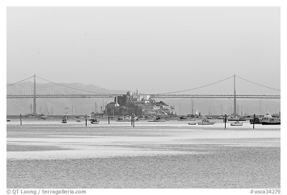 Alcatraz Island and Bay Bridge, sunset. San Francisco, California, USA