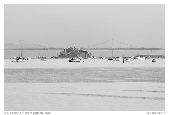 Harbor in Richardson Bay and city skyline painted in pink hues at sunset. San Francisco, California, USA (black and white)