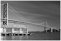 Old pier and Bay Bridge, early morning. San Francisco, California, USA (black and white)