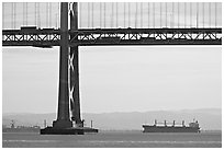 Tanker ship and Bay Bridge,  morning. San Francisco, California, USA (black and white)