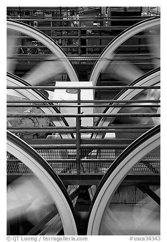 Wheels of cable winding machine in rotation. San Francisco, California, USA