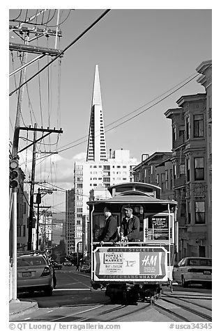 Cable car and Transamerica Pyramid. San Francisco, California, USA (black and white)