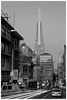 Chinatown street and Transamerica Pyramid, dusk. San Francisco, California, USA ( black and white)