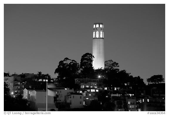 Coit Tower and Telegraph Hill at night. San Francisco, California, USA