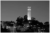 Coit Tower and Telegraph Hill at night. San Francisco, California, USA (black and white)