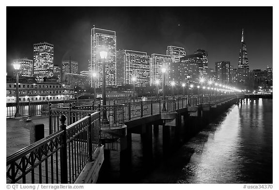 Embarcadero and Transamerica Pyramid seen from Pier 7 at night. San Francisco, California, USA (black and white)