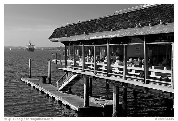 Restaurant at the edge of harbor. San Diego, California, USA (black and white)