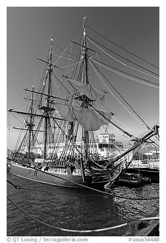 Maritime Museum with HMS Surprise and ferryboat Berkeley. San Diego, California, USA (black and white)