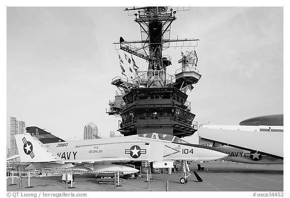 Navy aircraft and island superstructure, USS Midway. San Diego, California, USA (black and white)