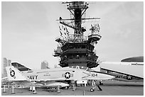 Navy aircraft and island superstructure, USS Midway. San Diego, California, USA (black and white)