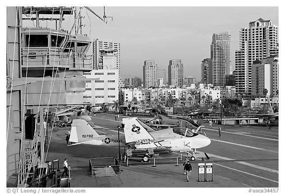 Flight control tower, aircraft, San Diego skyline, USS Midway aircraft carrier. San Diego, California, USA