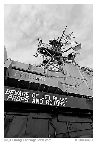 Island and flags,  USS Midway aircraft carrier. San Diego, California, USA (black and white)