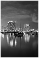 Yachts and skyline from Harbor Drive, at night. San Diego, California, USA ( black and white)