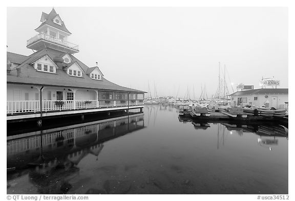 Period and modern boathouses in fog, Coronado. San Diego, California, USA