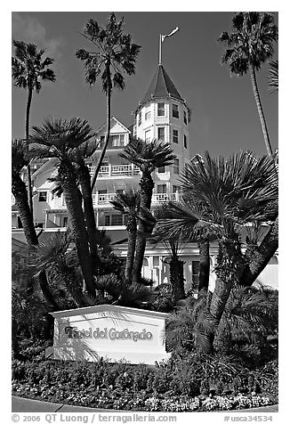 Sign, palm trees, and hotel Del Coronado. San Diego, California, USA (black and white)