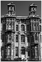 Twin towers of the Louis Bank of Commerce in baroque revival style,  Gaslamp quarter. San Diego, California, USA ( black and white)