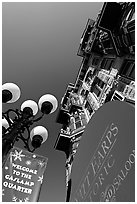 Gaslamp, signs, and facade of the Louis Bank of Commerce, Gaslamp quarter. San Diego, California, USA (black and white)