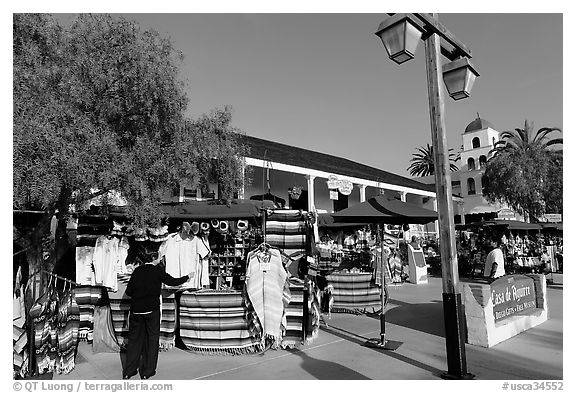 Store selling colorful mexican clothing, Old Town. San Diego, California, USA (black and white)
