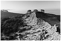 Eroded sandstone cliffs of Broken Hill,  Torrey Pines State Preserve. La Jolla, San Diego, California, USA (black and white)