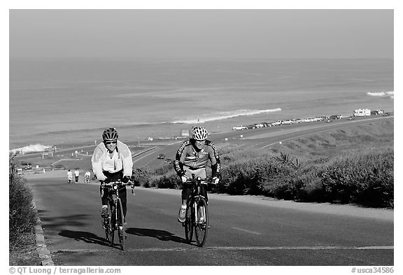 Bicyclists and ocean, Torrey Pines State Preserve. La Jolla, San Diego, California, USA