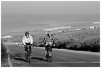 Bicyclists and ocean, Torrey Pines State Preserve. La Jolla, San Diego, California, USA ( black and white)