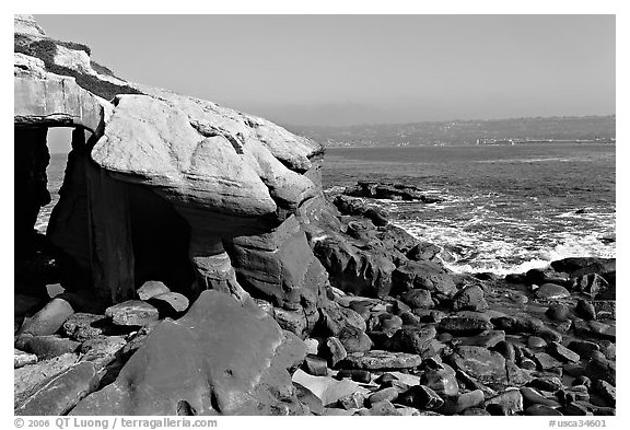 Coasline with seacave at the Cove. La Jolla, San Diego, California, USA (black and white)